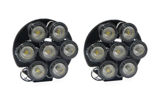 1804--3800 Światła do jazdy dziennej LED 7 PointŚwiatła do jazdy dziennej LED 7 POINTposiadają homologację E4 i RL 00, ilość diod: 2x7 Piranha LEDs (każda po 1 watt), napięcie 12-24V, wodoodporne, możliwość montażu w krążku lub w dowolnej konfiguracji, mod
