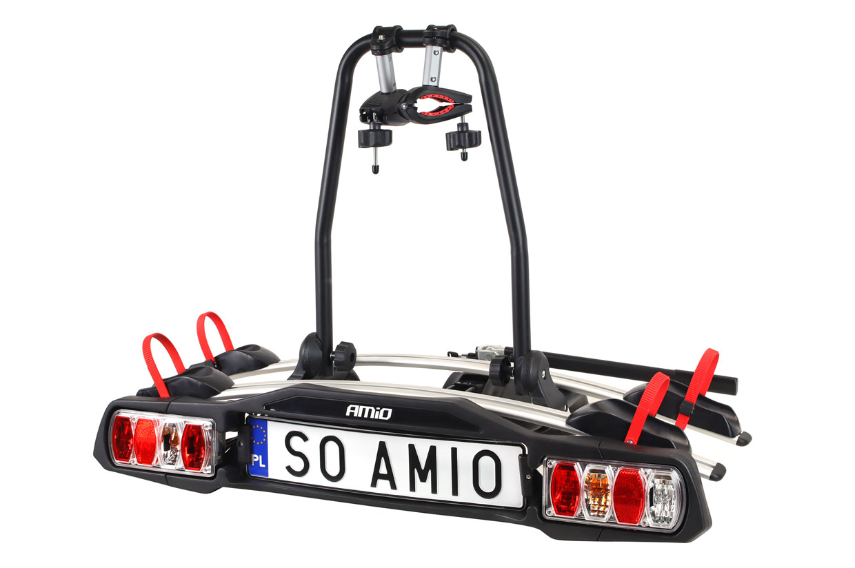 AMI-02582--Solidna odchylana platforma montowana na hak do przewozu od jednego do czterech rowerów. Łatwy w montażu, praktyczny bagażnik rowerowy o dużej ładowności. Mocowanie umożliwia bezpieczny, szybki montaż i nie wymaga narzędzi. Możliwość uchylenia bagażn