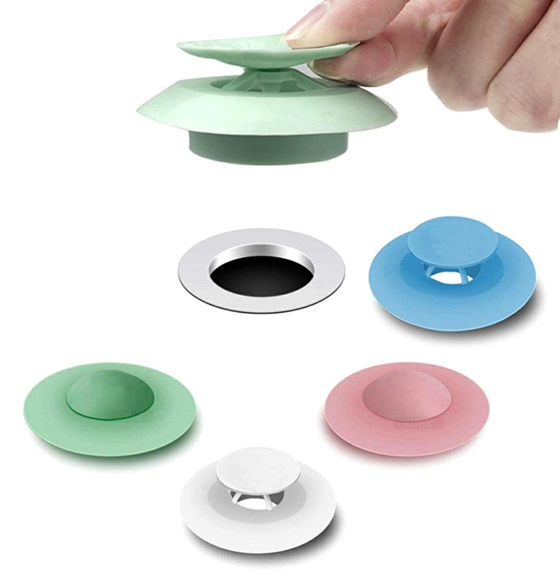 AG568B--Solidny, silikonowy korek do zlewu z sitkiem. Standardowe wymiary (10 cm średnicy) ułatwią dopasowanie do kuchennego zlewozmywaka, ale r&amp;oacute;wnież do odpływu w umywalce czy w wannie. Pasuje do otwor&amp;oacute;w odpływowych o średnicy 