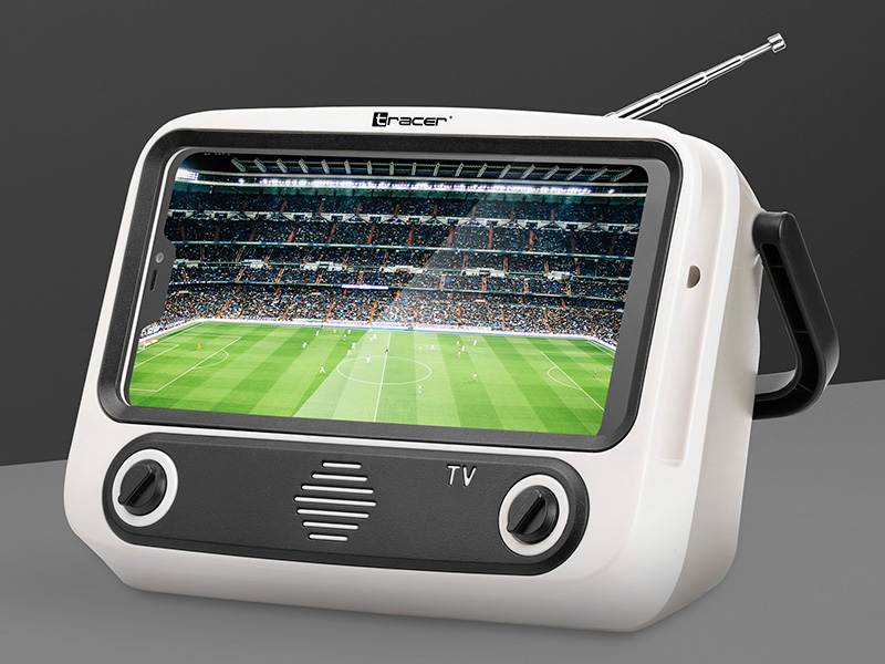 TRAUCH46874--Stojak na telefon z głośnikiem Bluetooth Tracer TV79Tracer TV79 to innowacyjne urządzenie o wyglądzie retro telewizora. Designerski głośnik Bluetooth z miejscem na telefon, szybko odmieni Twoje pomieszczenie. Stojak Tracer TV79 jest niezwykle kompakt