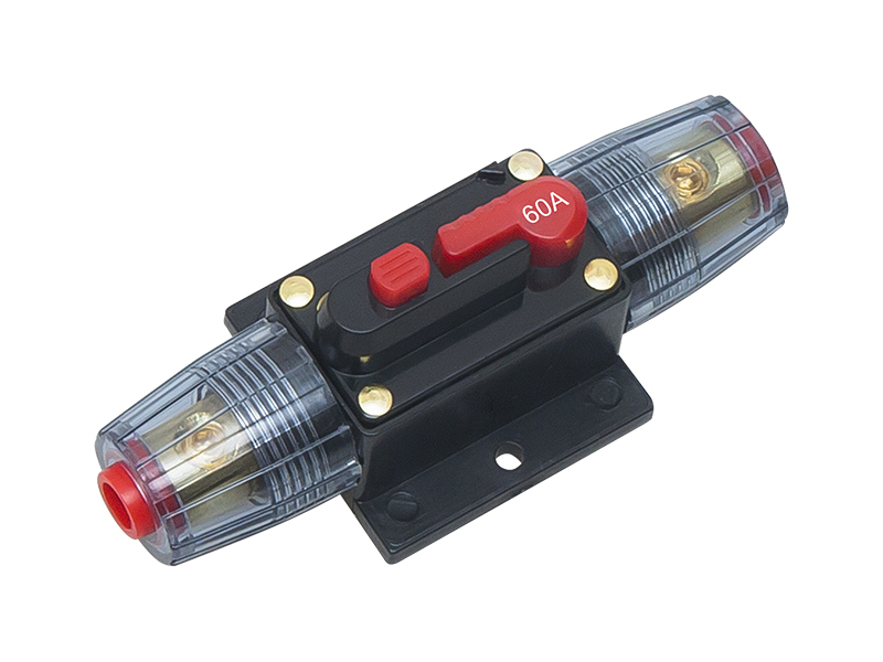 3844#--Samochodowy bezpiecznik automat. 60A II  Automatyczny wyłącznik obwodu używany do zabezpieczenia przed przepięciem samochodowych urządzeń audio/video. Parametry techniczne:  Napięcie wejściowe: 12-48 Volt Prąd: 60A Wymiary:  Szerokość 2.5 cm (4.2cm z