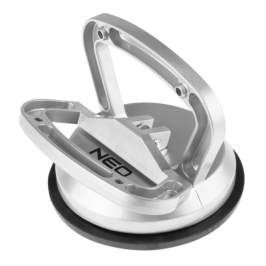TOP-56-801--Przyssawka do szyb pojedyncza, 50 kg, monolityczyny aluminiowy korpus, wytrzymałe, aluminiowe zatrzaski. Przeznaczona do bezpiecznego przenoszenia i montażu różnych elementów np. szyb, glazury, gresu, blach, płyt laminowanych i wielu innych.